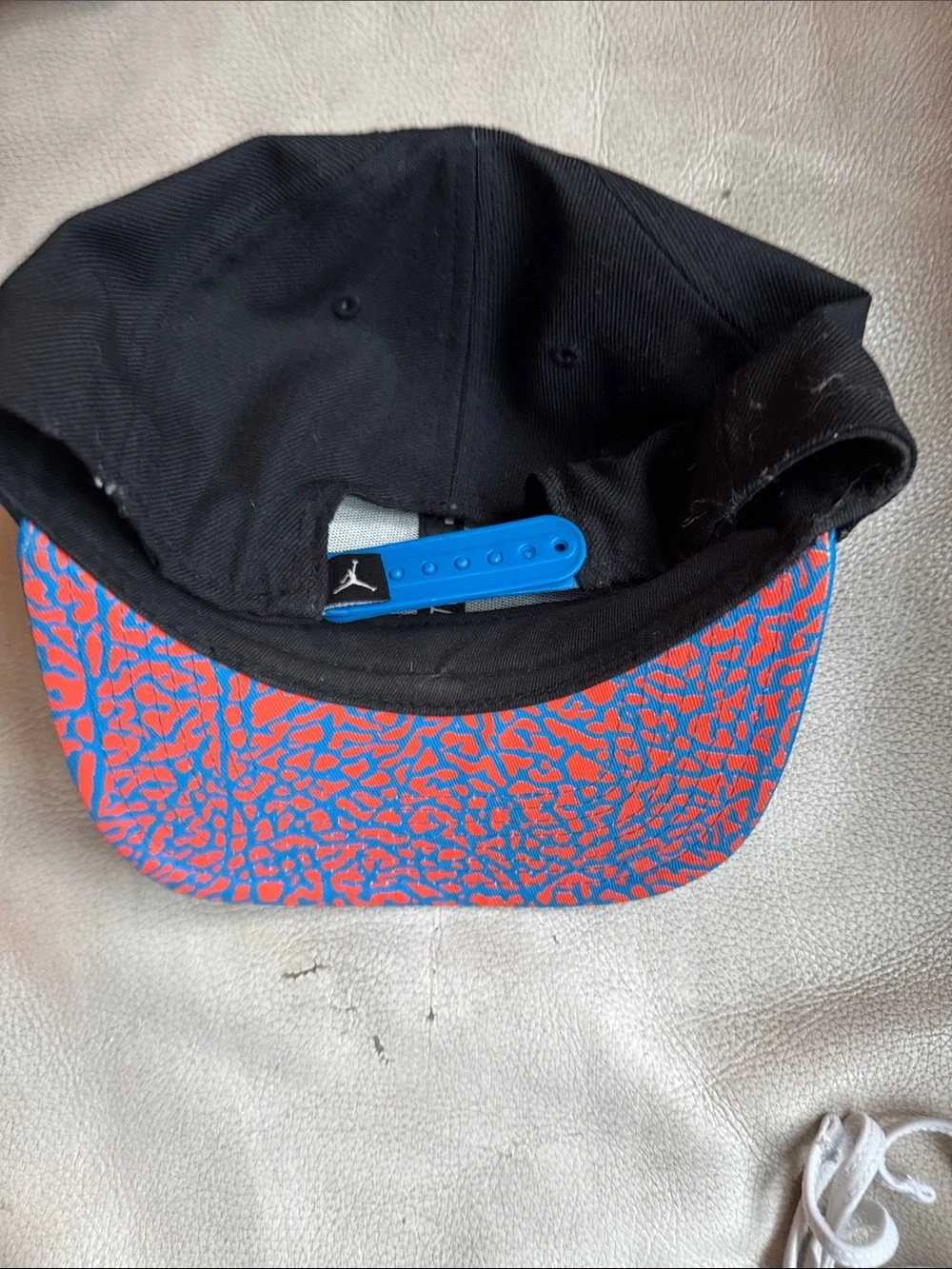 Nike Black & Blue Snapback Hat with Orange Jumpman